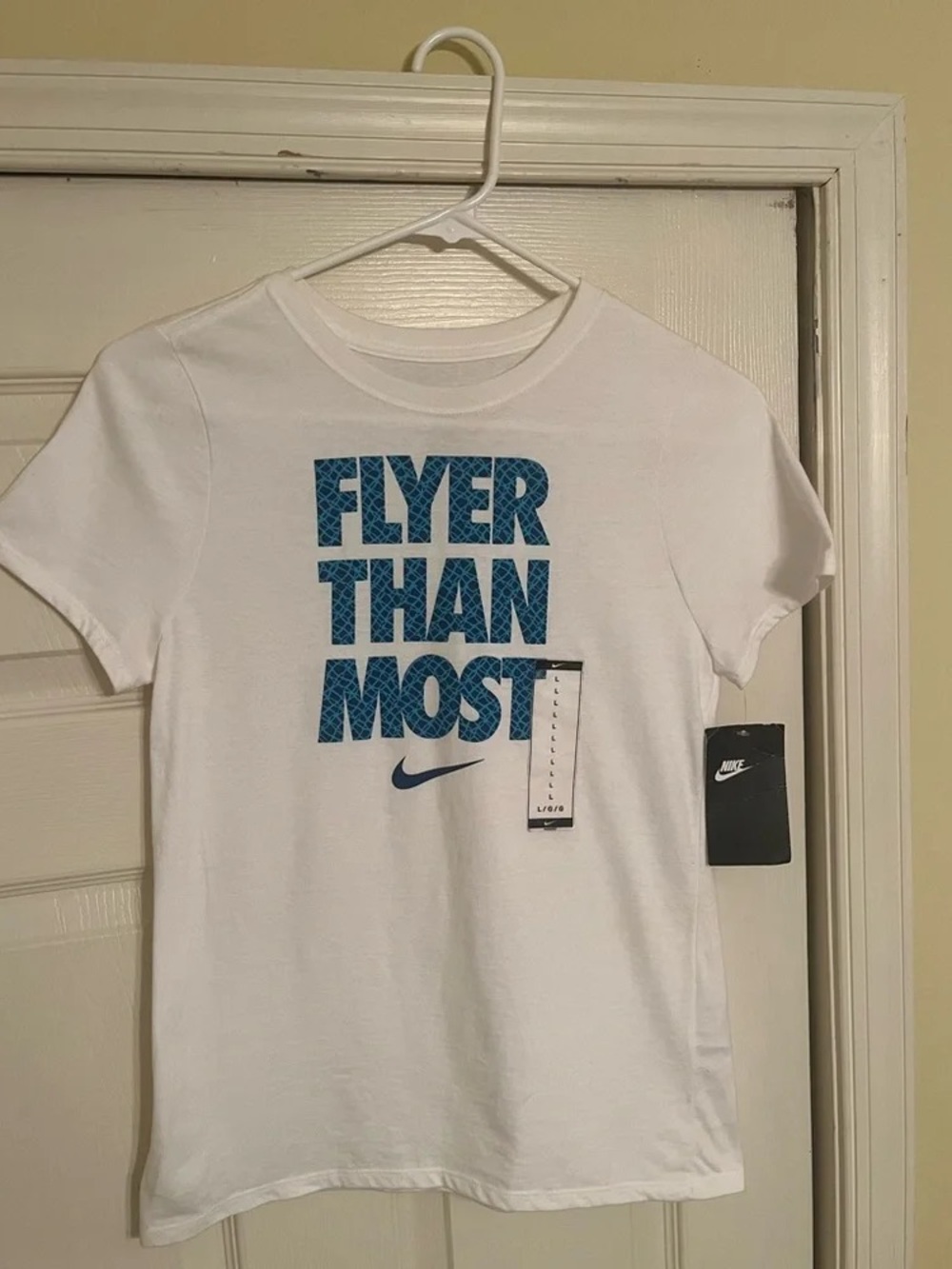 Nike White Tee with Blue 'Flyer Than Most' Graphic